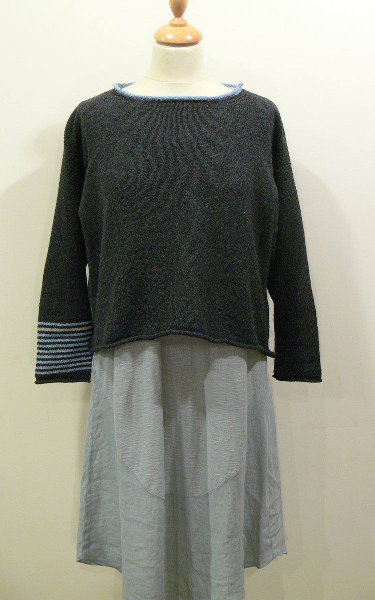 Strathy Short Tunic in graphite/delft/cloud. One striped sleeve. Knitted in silk/lambswool. Designed and made in Orkney.